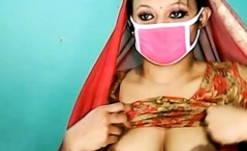 Seductive Indian Milf Shows Off Her Big Hooters On Webcam