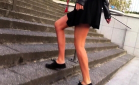 street-voyeur-finds-a-pretty-brunette-with-sexy-slim-legs