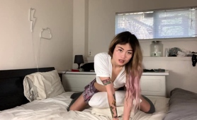 Horny Asian Girl Humping Pillows And Playing With Sex Toys