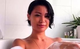 Striking Amateur Oriental Babe Posing Naked In The Bathtub