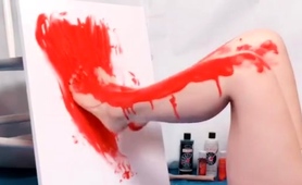 Redhead Milf Poses Naked While Covering Herself In Paint