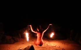 mysterious-milf-gives-amazing-fire-dancing-performance