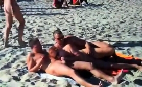 Amateur Swingers Enjoying Hardcore Group Sex On The Beach